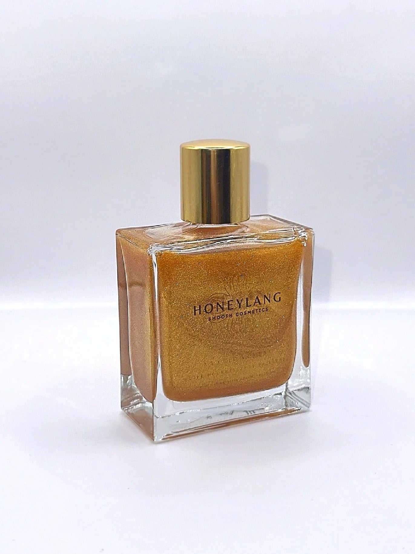 Huile pailletée nourrissante  "My Gold Moment" - 50ML