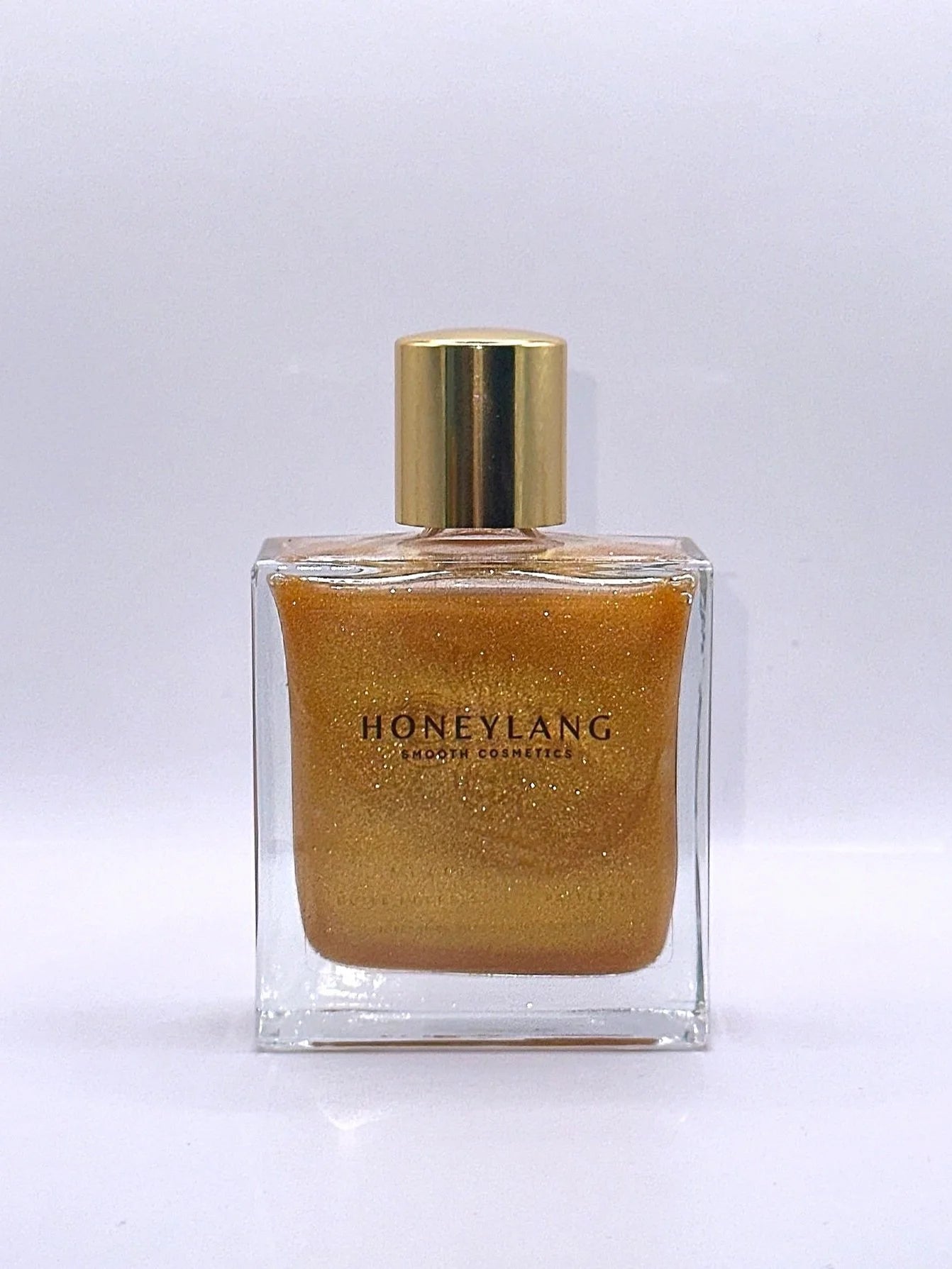 Huile pailletée nourrissante  "My Gold Moment" - 50ML